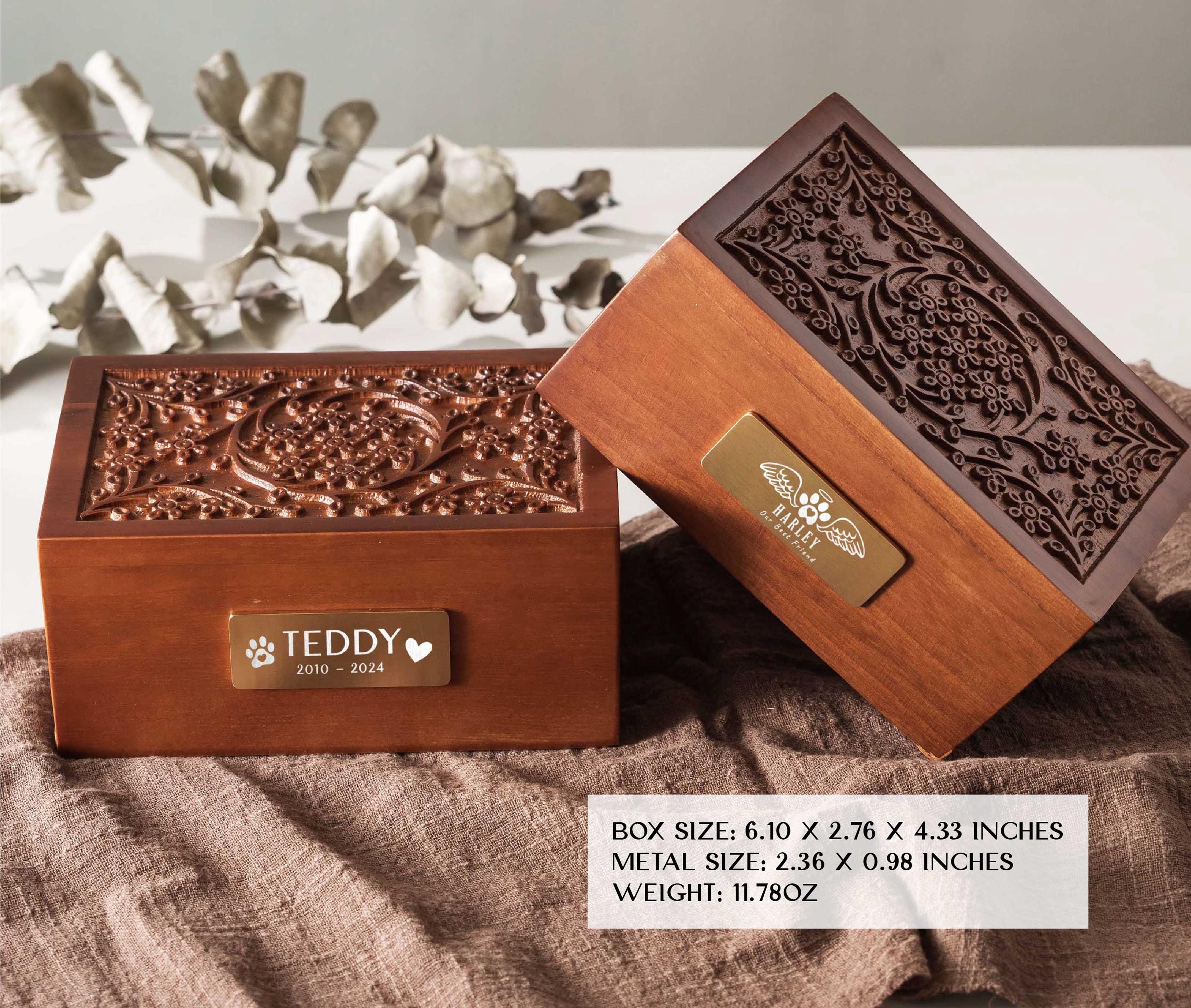 a wooden box with a decorative design on the lid