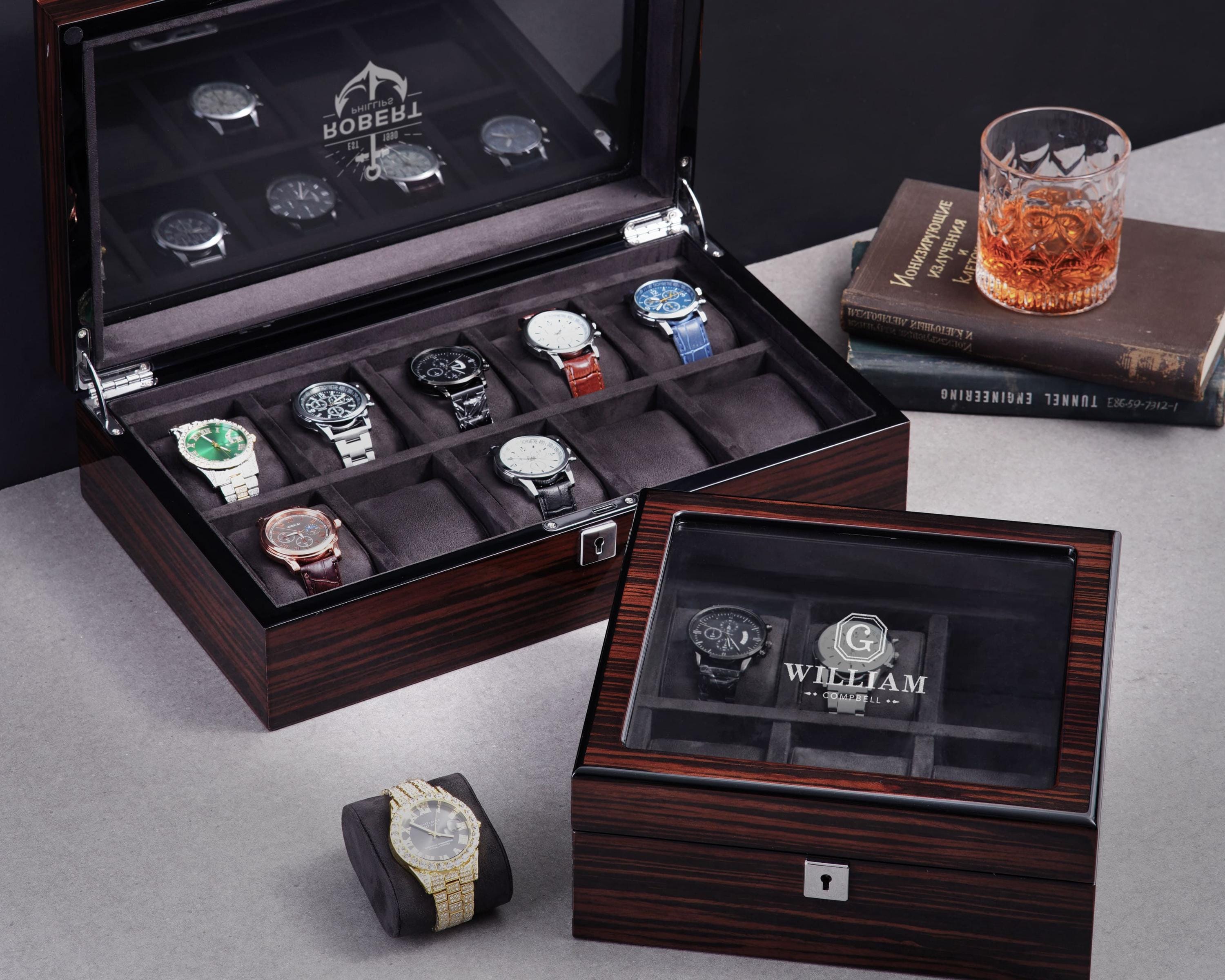 a wooden watch box with six watches in it