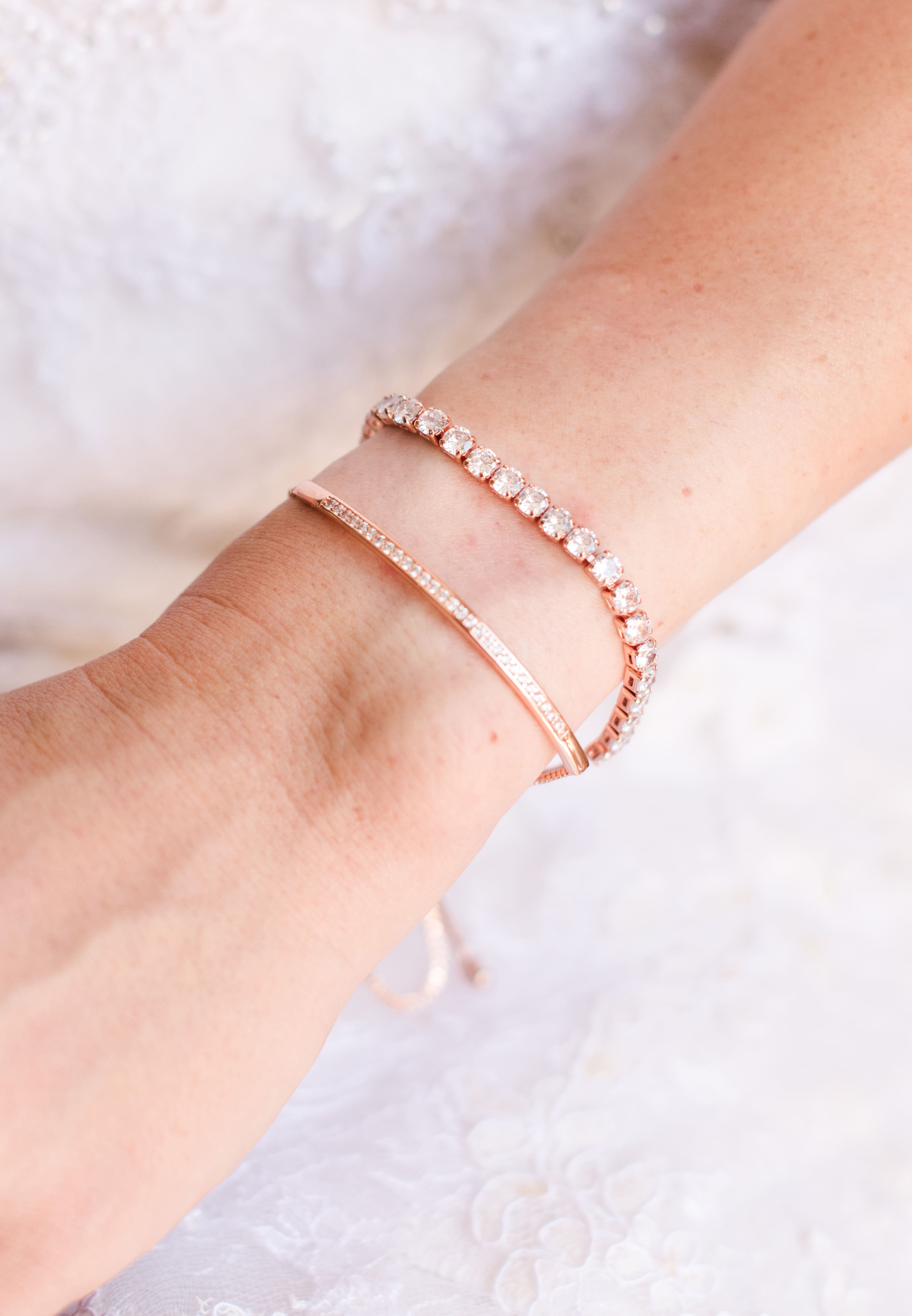 The Wedding Tennis Bracelet displayed from different angles, showcasing its exquisite design and dazzling diamonds.