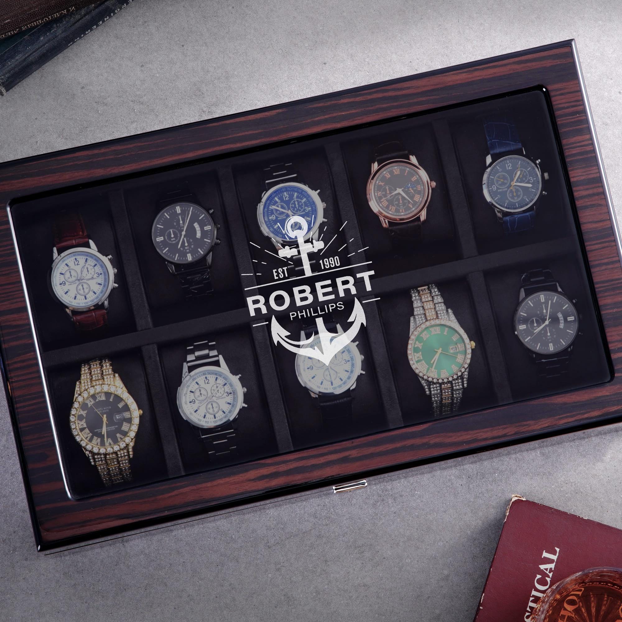 a watch display case with twelve watches in it