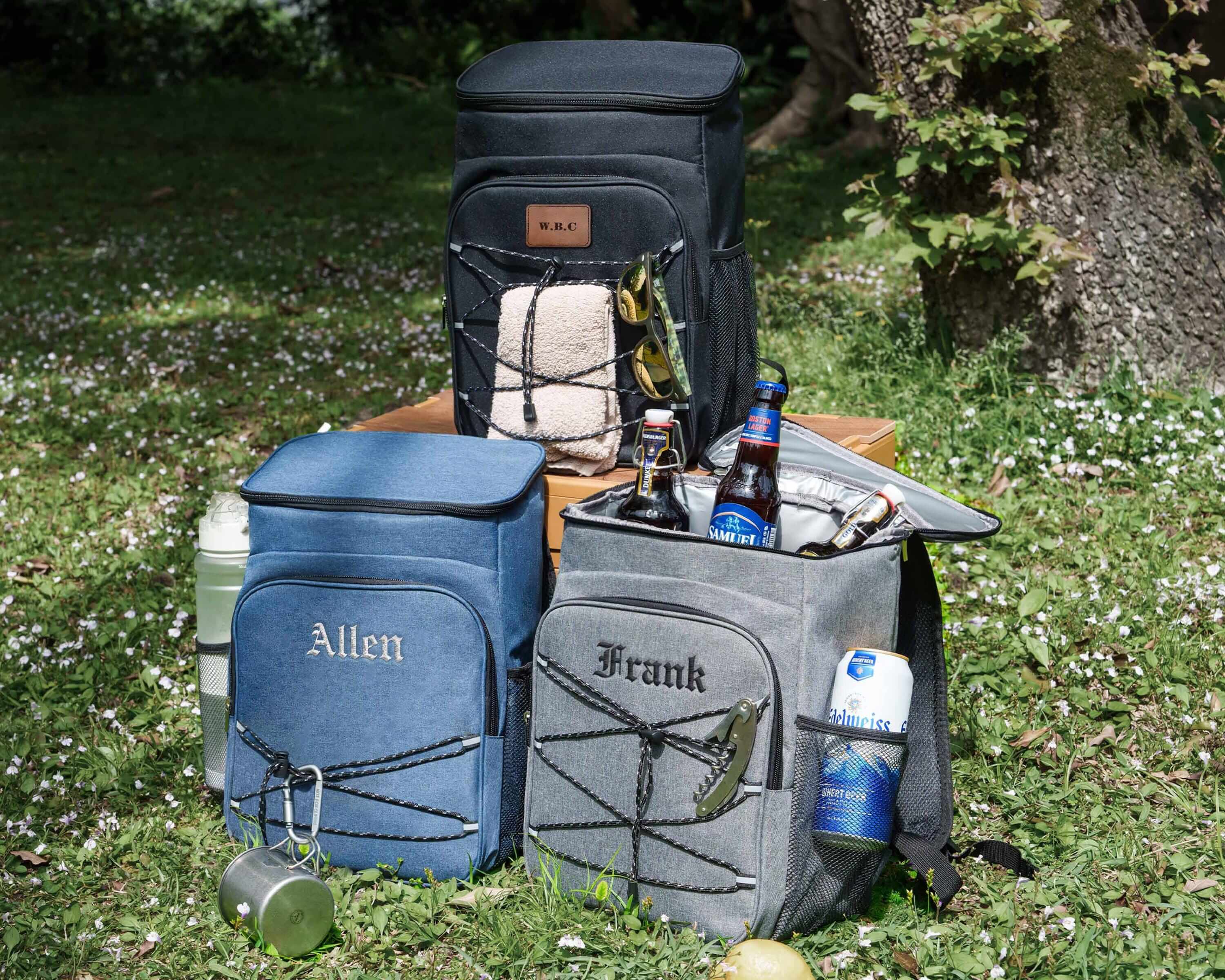 a couple of bags that are sitting in the grass