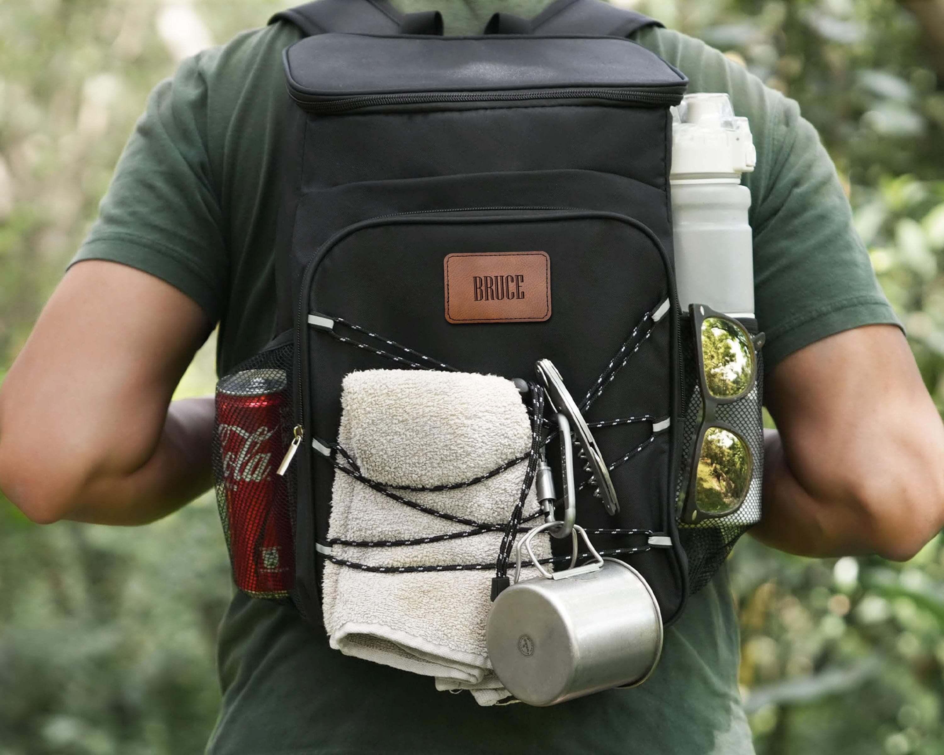 a man with a back pack and a drink in his hand