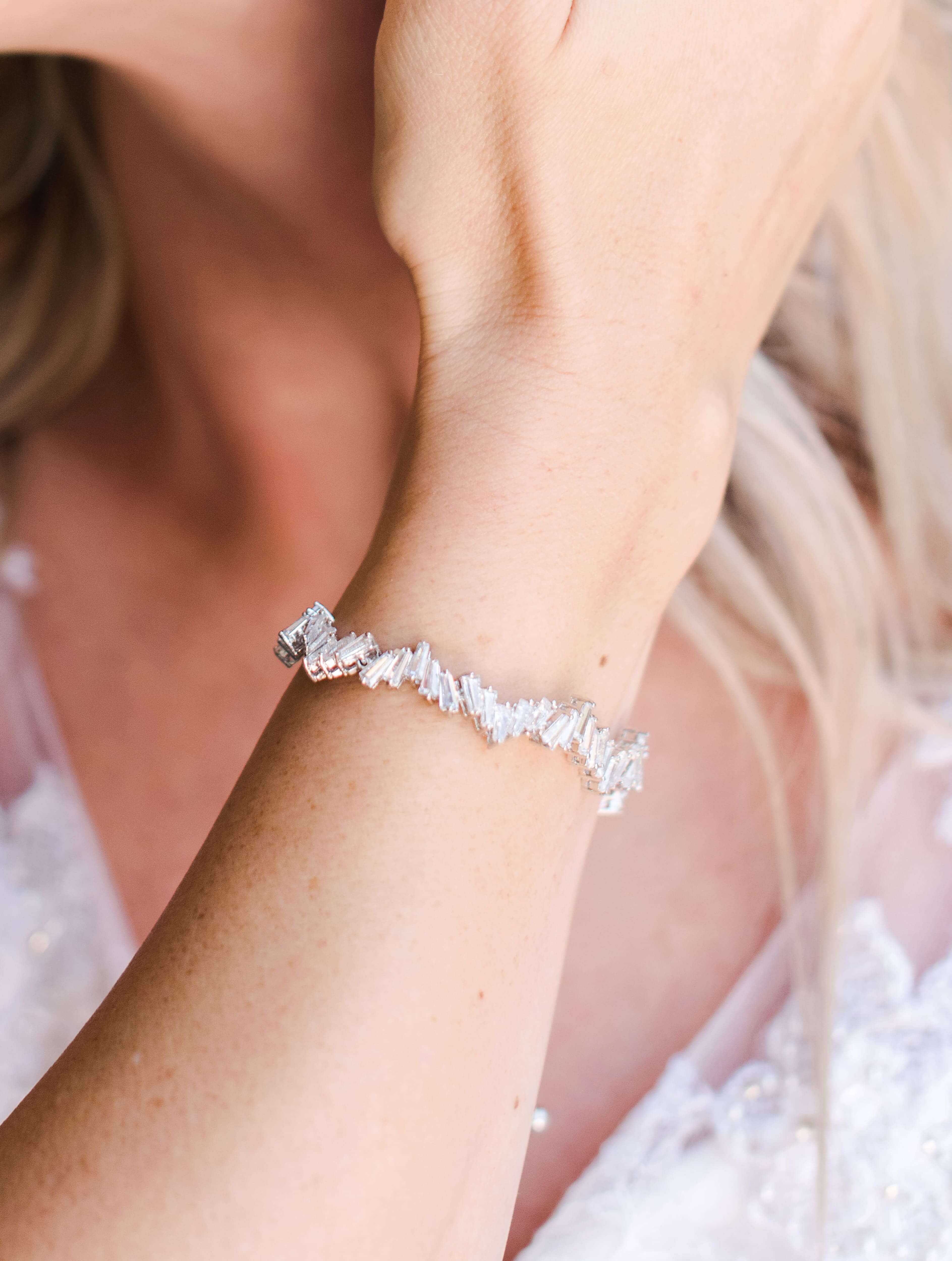 Multiple views of the Sparkly Dainty Bracelet, showcasing its delicate design and sparkling details.