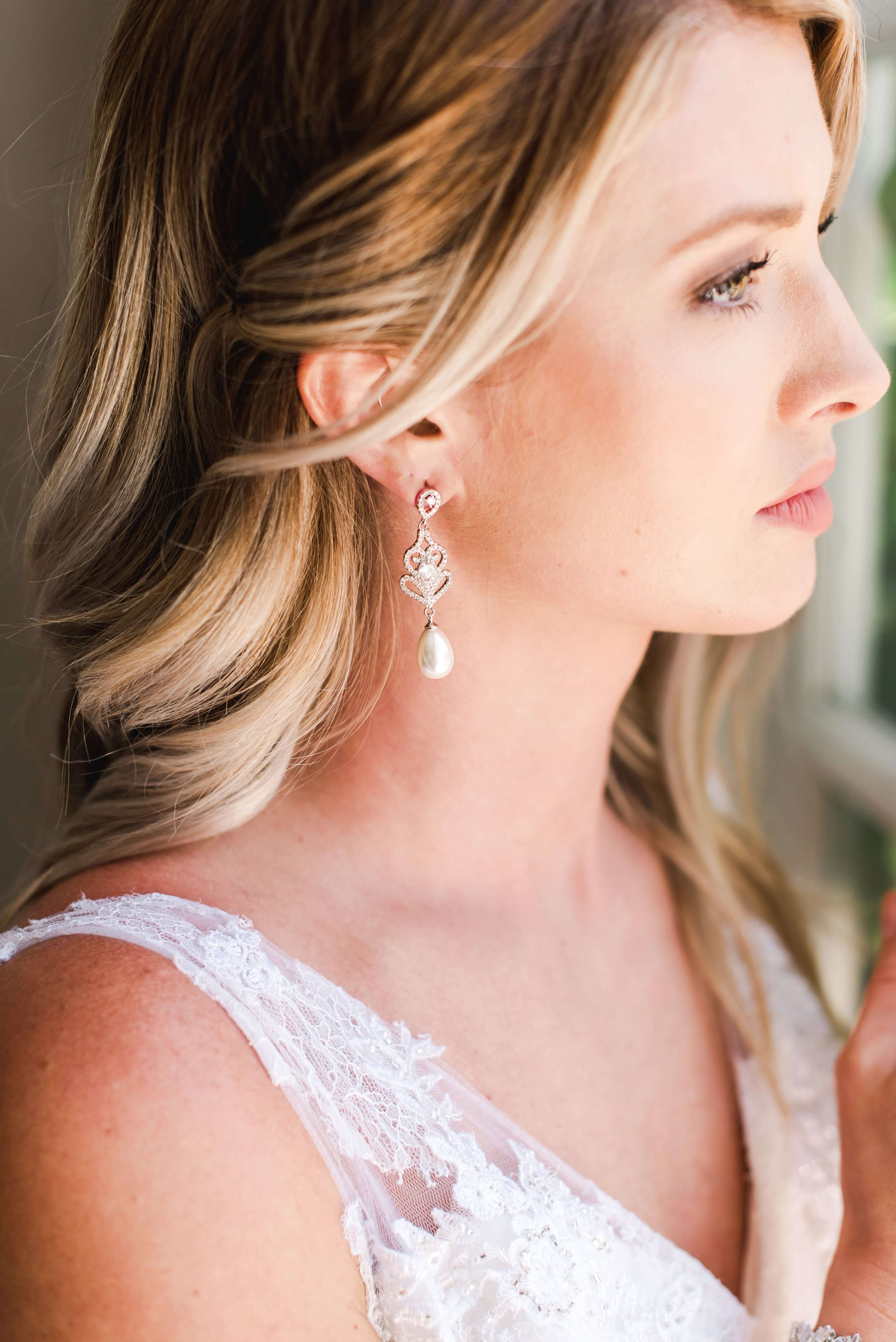 Pearl Drop Earrings - A beautiful bride wear Wedding Pearl Earrings on her wedding day - Hundred Hearts 