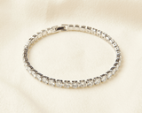 The Bridal Diamond Line Bracelet displayed from different angles, showcasing its delicate design and sparkling diamonds.