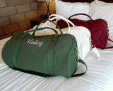 Personalized white, olive green and mulberry Duffle Bags with initials.