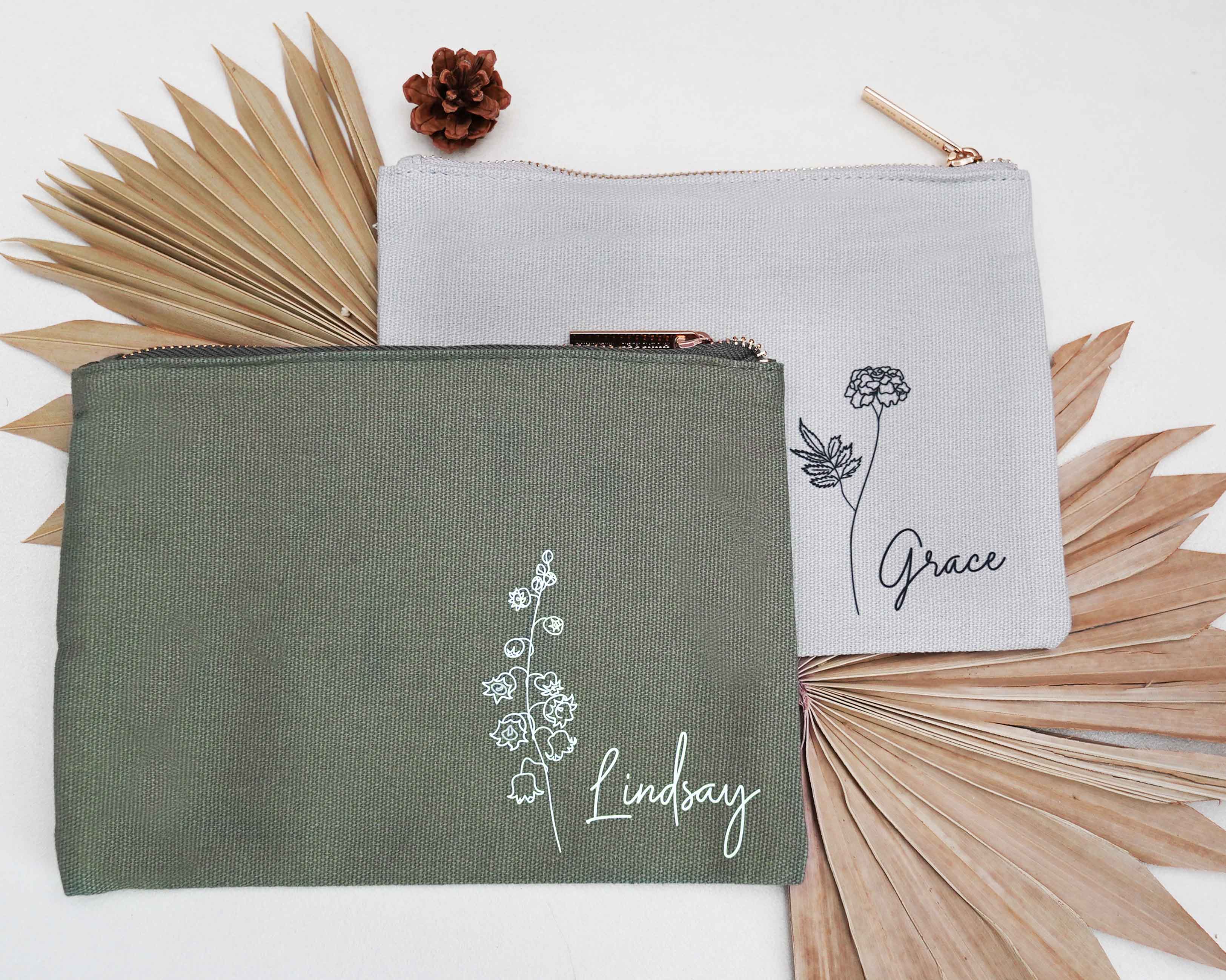Gray and Sage Personalized Cosmetic Bags with birth flower image and name.